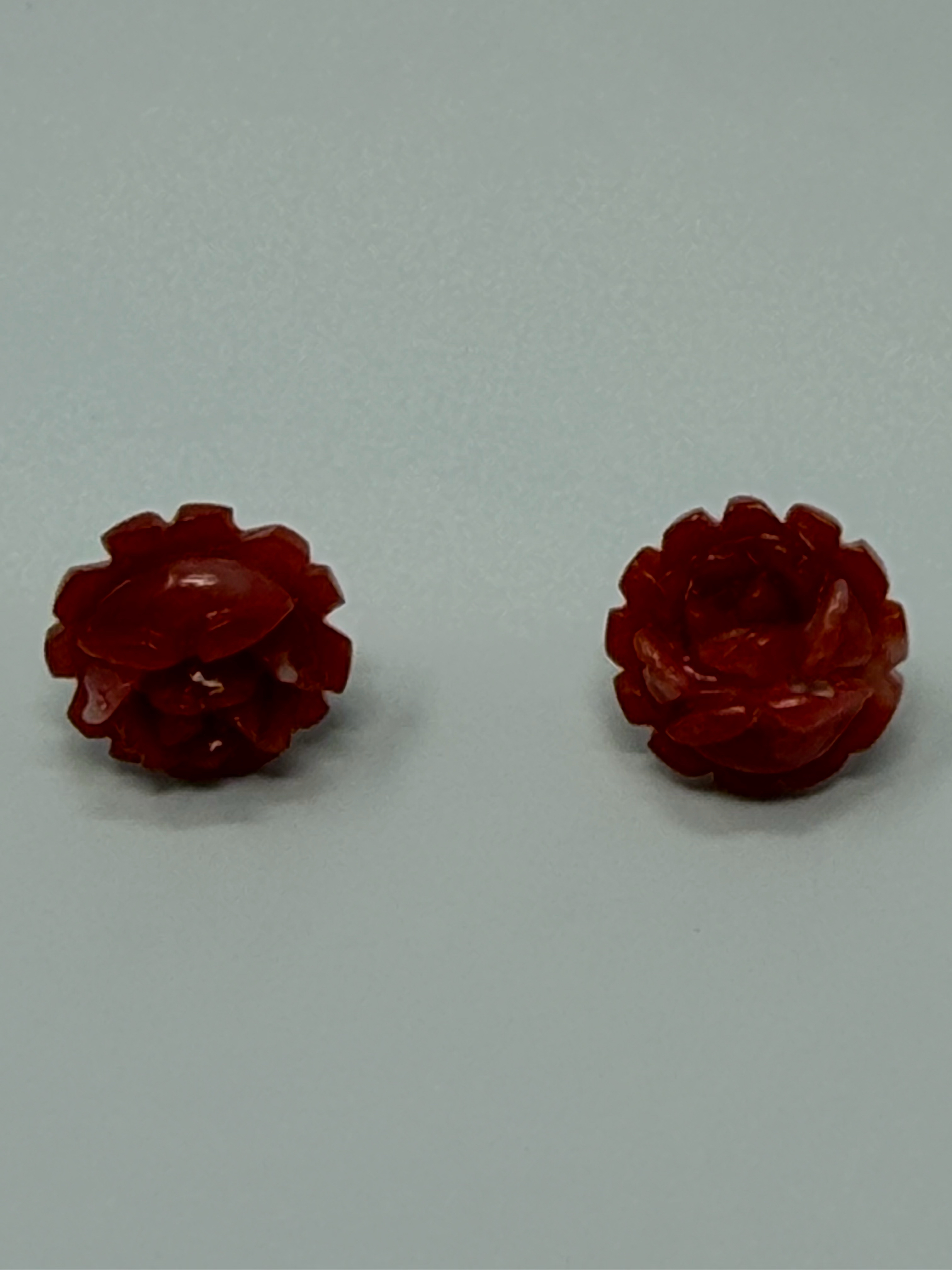 Hand-carved deep red coral rose earrings